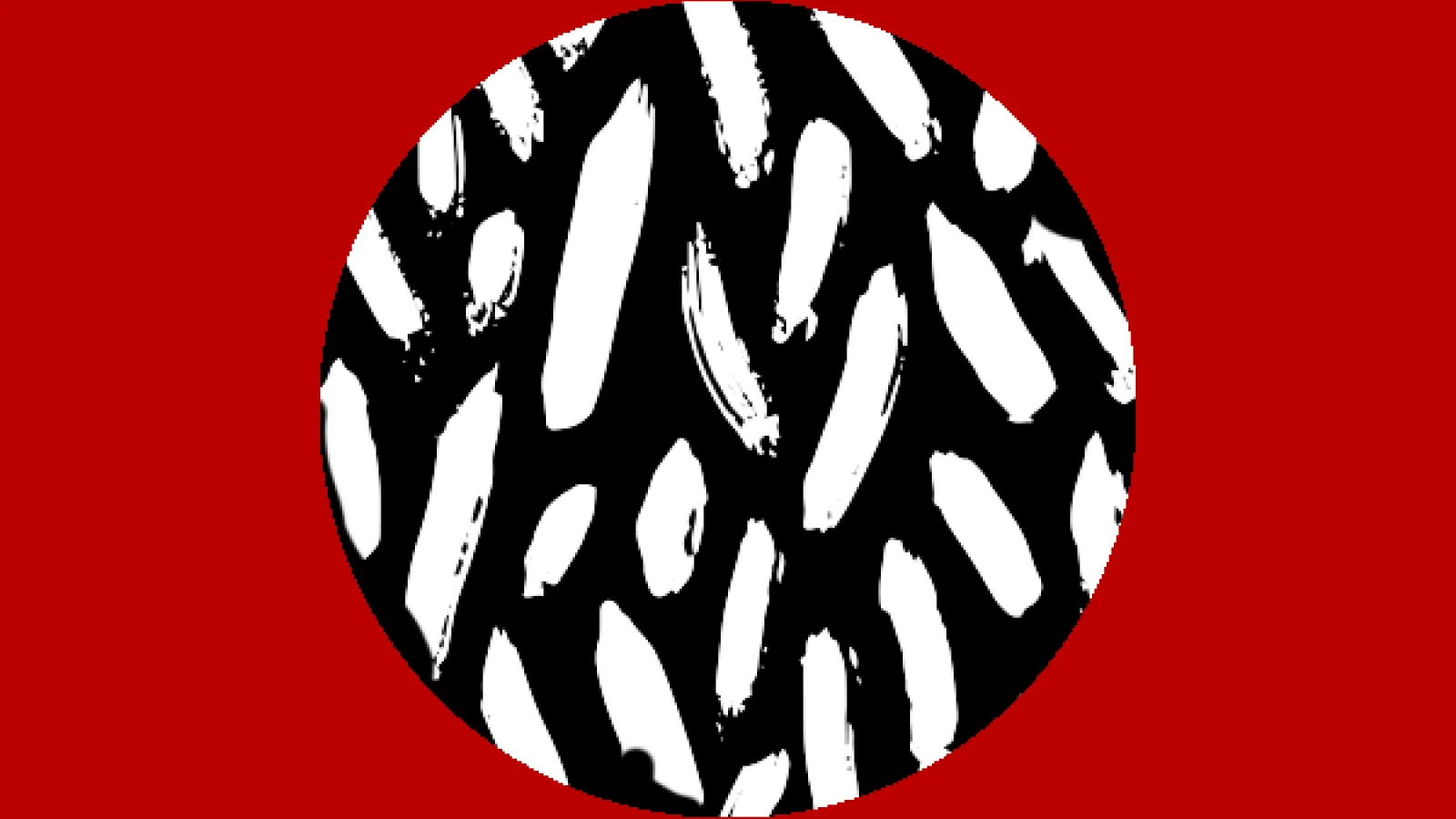 A red rectangle with a circle in the middle of it- the circle is black with white brush strokes scattered throughout. 