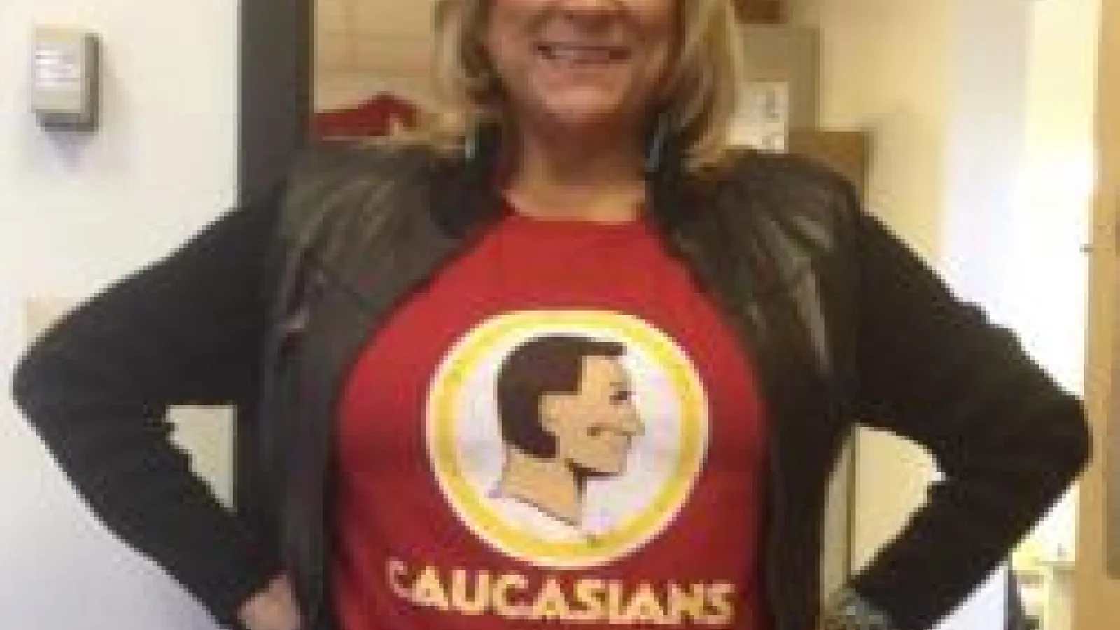 woman wearing Caucasians shirt in protest to racist mascots