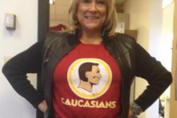 woman wearing Caucasians shirt in protest to racist mascots